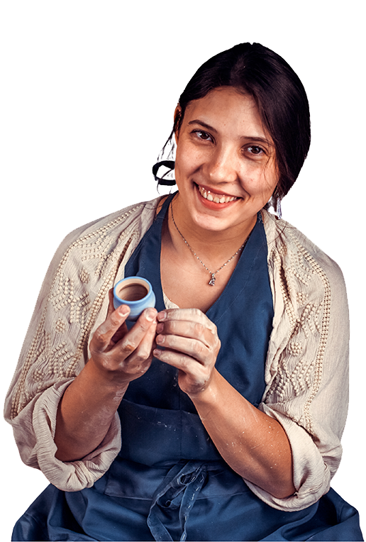 Female entrepreneur showcasing her product, symbolizing the need for stronger digital presence for women-led businesses.